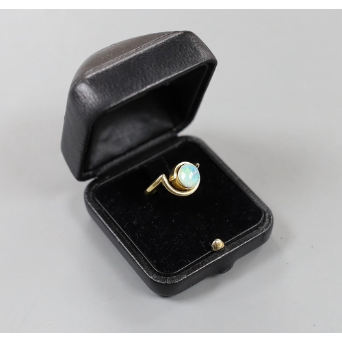 934 - A modern 18ct gold and white opal set ring, size R, gross weight 6.2 grams.