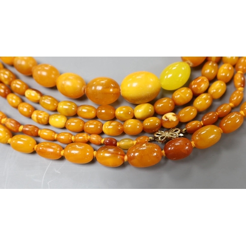 942 - Three assorted amber bead necklaces, longest 112cm, gross weight 115 grams.