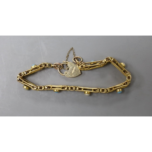 945 - A 9ct gold , split pearl and turquoise set gate link bracelet, 17.5cm, gross weight 17.4 grams.... 