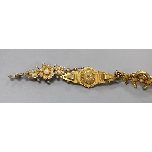 946 - Two early 20th century 9ct and gem set bar brooches, gross weight 4.7 grams, a similar 15ct horsesho... 