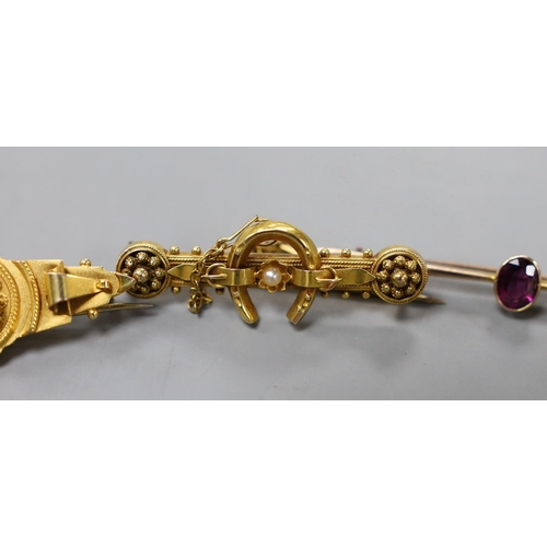 946 - Two early 20th century 9ct and gem set bar brooches, gross weight 4.7 grams, a similar 15ct horsesho... 