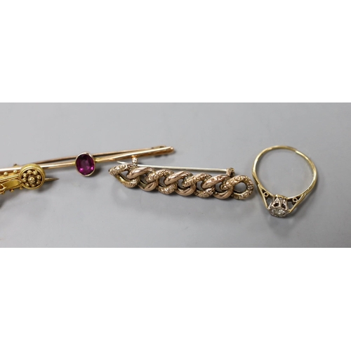 946 - Two early 20th century 9ct and gem set bar brooches, gross weight 4.7 grams, a similar 15ct horsesho... 