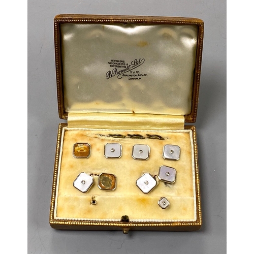 949 - An early to mid 20th century part set of 18ct & 9ct, mother of pearl and diamond set octagonal dress... 