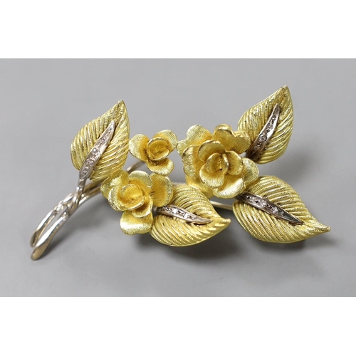 950 - A 1960's two colour 18ct gold and diamond chip set floral spray brooch, maker CJ Ltd, 62mm, gross we... 