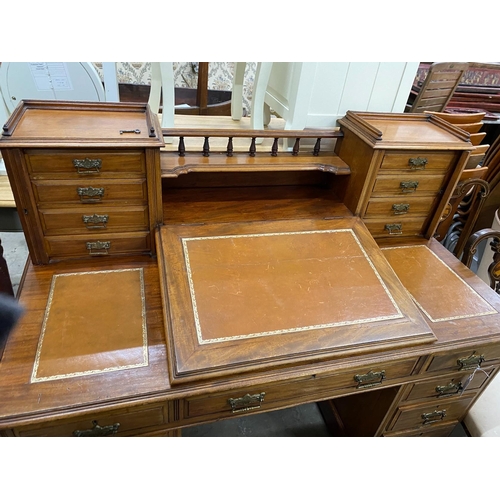 99 - A late Victorian mahogany pedestal desk with hinged slant front, width 137cm, depth 73cm, height 113... 