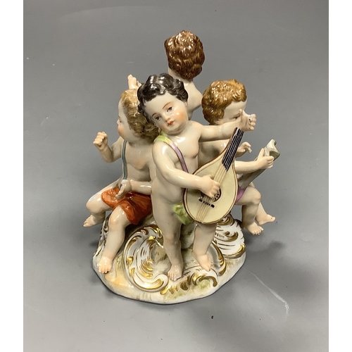 534 - A Meissen group of four putti musicians, late 19th century, 11 cm high, losses