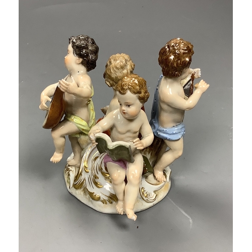 534 - A Meissen group of four putti musicians, late 19th century, 11 cm high, losses