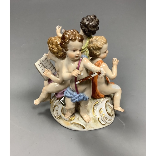 534 - A Meissen group of four putti musicians, late 19th century, 11 cm high, losses