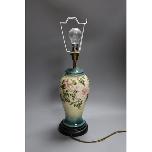 398 - A Moorcroft vase lamp with floral decoration, 38cm tall excl. bulb