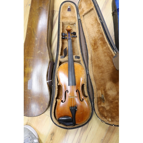 403 - Two cased three quarter size violins, one labelled the London violin co Ltd, length of back 33.5 cm ... 