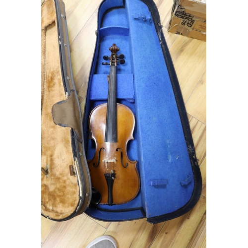 403 - Two cased three quarter size violins, one labelled the London violin co Ltd, length of back 33.5 cm ... 