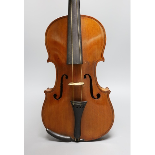 431 - An early 20th century cased violin, length of back 36 cm