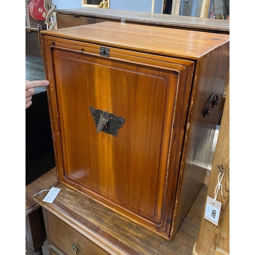 1008 - A Chinese pine cabinet housing an arrangement of eight drawers, width 48cm height 56cm