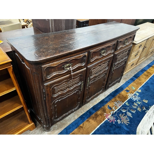 1013 - An 18th century French Provincial oak buffet, lacking two feet, width 171cm depth 48cm height 110cm... 