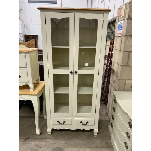 1020 - An oak and eau de nil painted glazed cabinet, width 90cm height 190cm