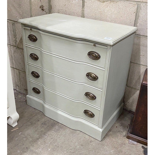 1021 - An eau de nil painted chest with brushing slide and four drawers, width 76cm