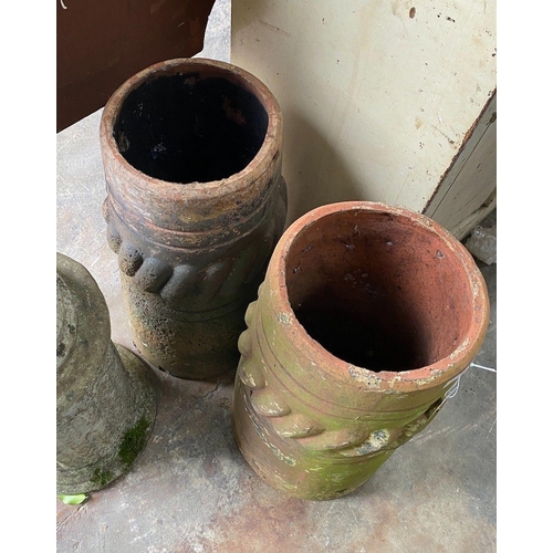 1026 - A pair of Victorian terracotta chimney pots, height 63cm