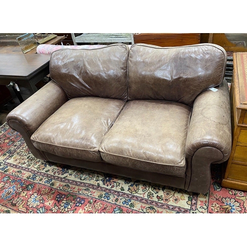 1037 - A Laura Ashley brown leather upholstered two seater settee, width 172cm