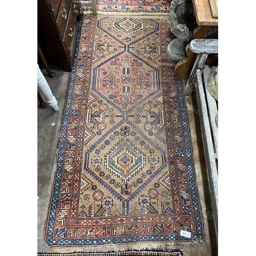 1048 - Two Caucasian rugs, red ground with central medallion, 198 x 134cm, the other 227 x 112cm