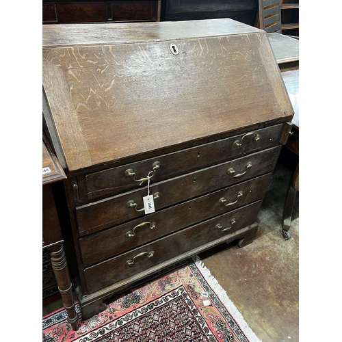 1052 - A George III oak bureau, width 91cm depth 50cm height 102cm