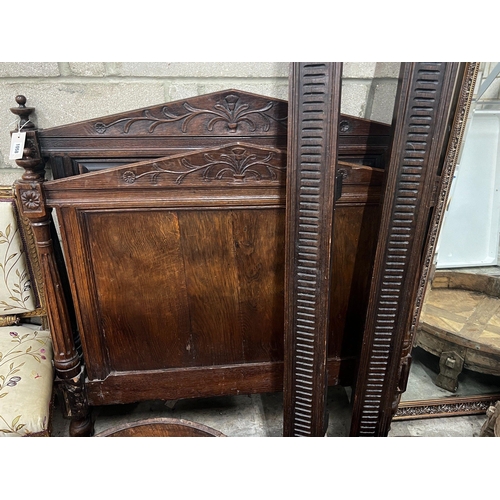 1057 - A late 19th century French carved oak single bed frame, width 110cm height 115cm