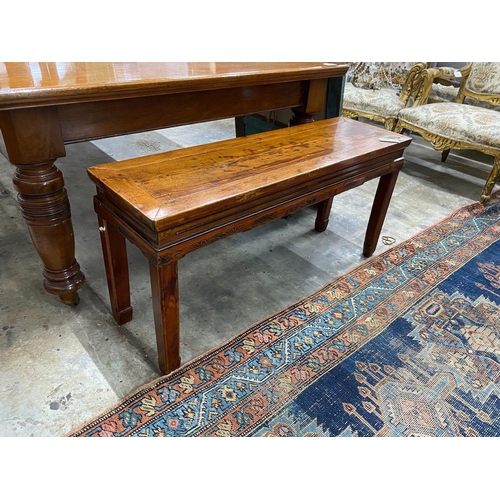 1059 - A Chinese elm bench seat, width 111cm