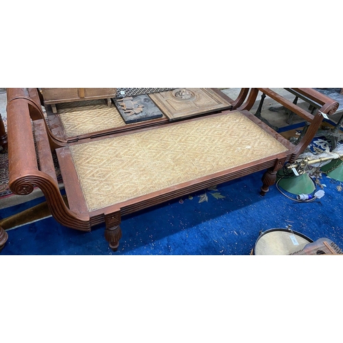 1064 - An Asian hardwood day bed with caned seat, width 212cm depth 71cm