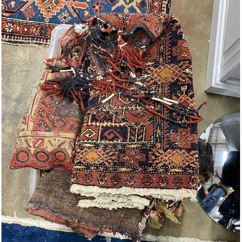 1068 - A group of assorted Caucasian saddlebags and other small rugs