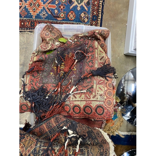 1068 - A group of assorted Caucasian saddlebags and other small rugs