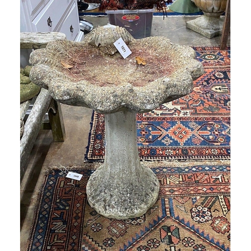 1071 - A reconstituted stone bird bath, width 55cm height 69cm