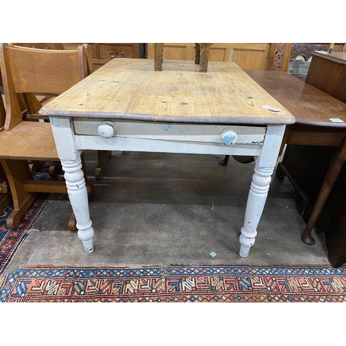 1074 - A Victorian pine and later painted kitchen table, with frieze drawer, width 122cm depth 87cm