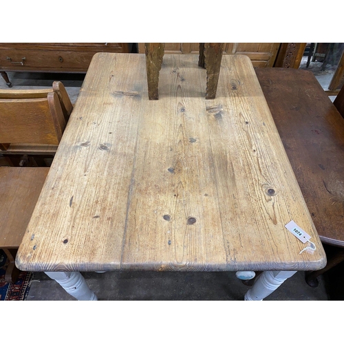 1074 - A Victorian pine and later painted kitchen table, with frieze drawer, width 122cm depth 87cm