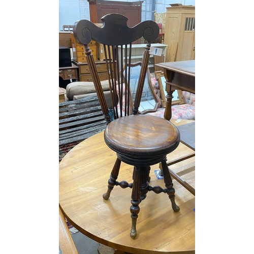 1086 - A 19th century French walnut harpist chair, with bronze feet