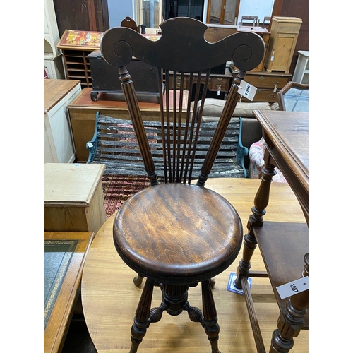 1086 - A 19th century French walnut harpist chair, with bronze feet