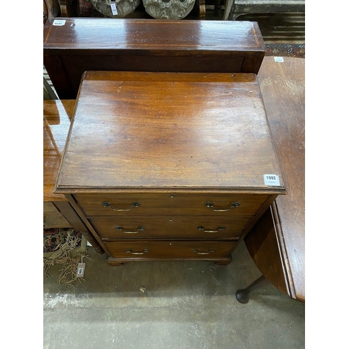 1092 - A George III style mahogany chest of three drawers, width 63cm