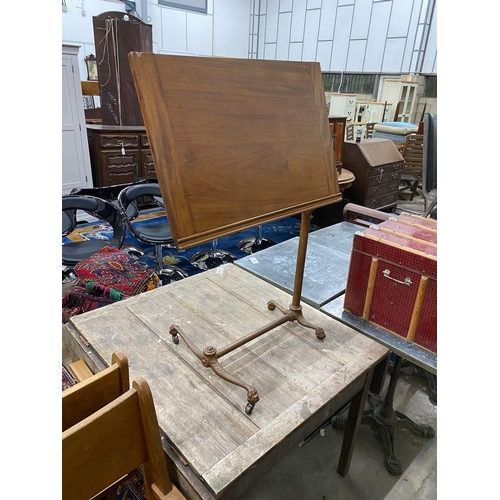 1094 - An Edwardian mahogany and cast iron invalid's table, width 68cm