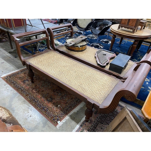 1097 - An Asian hardwood day bed with cane seat, length 210cm