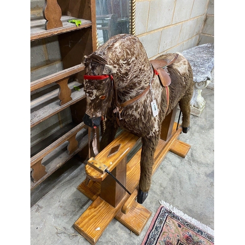 1106 - A modern rocking horse on a pine underframe, 112 cm long