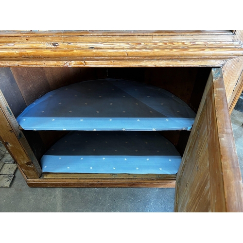 1118 - A George III pine barrel back standing corner cabinet, width 116cm depth 50cm height 220cm