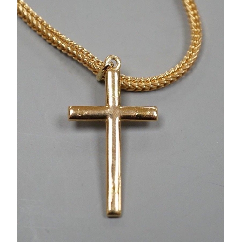 1933 - A modern Italian 750 yellow metal cross pendant, 32mm, on an Italian 750 chain, 66cm, 27.4 grams.... 