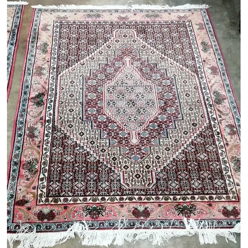 1099 - A Senneh blue ground rug, 150 x 120cm