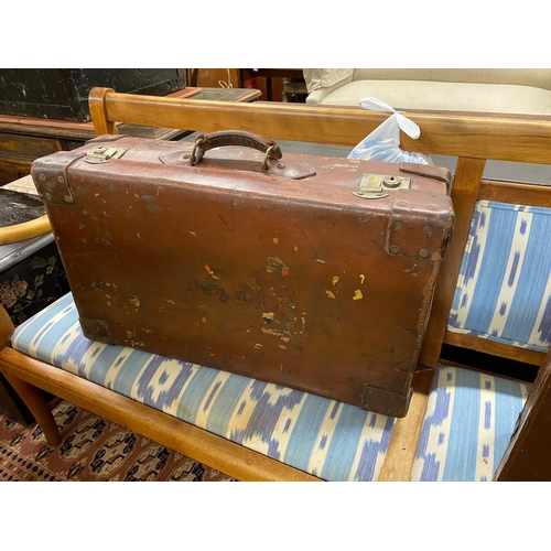 1007 - Four vintage suitcases, largest 82 x 53cm