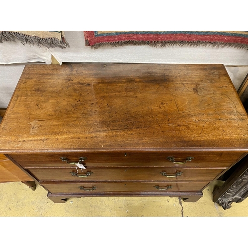 1015 - A George III mahogany chest of three long drawers, bracket supports, width 114cm, depth 55cm, height... 