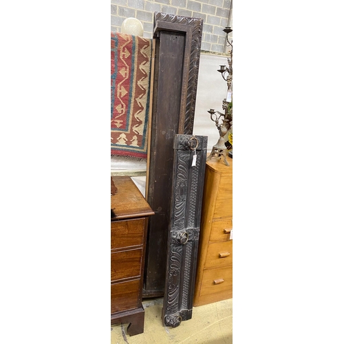 1017 - Two 19th century carved oak pediments, larger 200cm