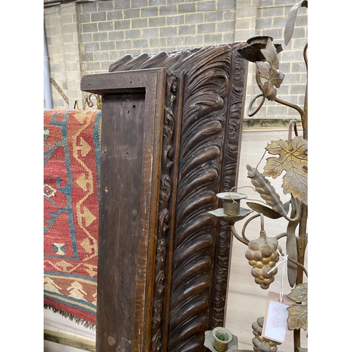 1017 - Two 19th century carved oak pediments, larger 200cm