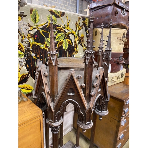 1022 - A 19th century Gothic style carved oak shrine, width 60cm, height 169cm