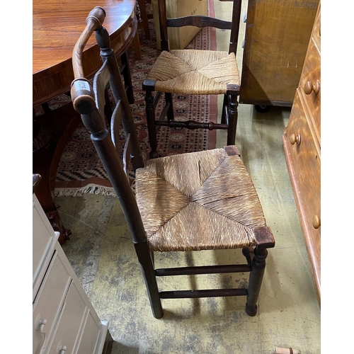 1036 - A set of six rush seated ladderback dining chairs