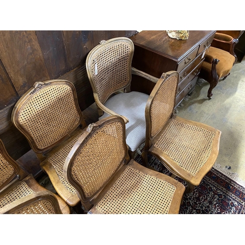 1042 - A set of five French carved beech dining chairs and a similar elbow chair