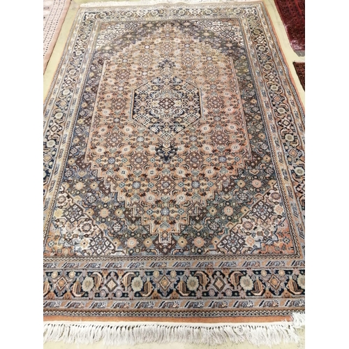 1080 - A North West Persian blue ground carpet, 260 x 170cm