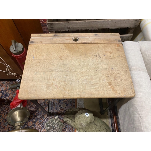 1083 - A vintage oak student's desk, width 60cm, depth 46cm, height 76cm